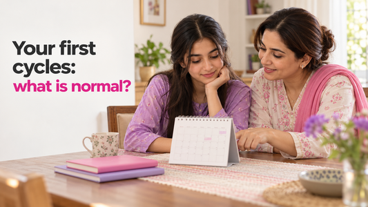 Teen girl and trusted adult reviewing a simple period calendar at home