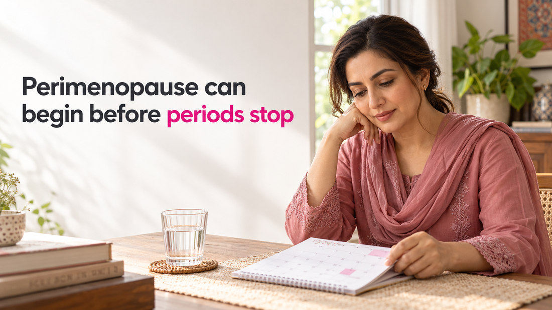 Pakistani woman reviewing a calendar while learning about perimenopause